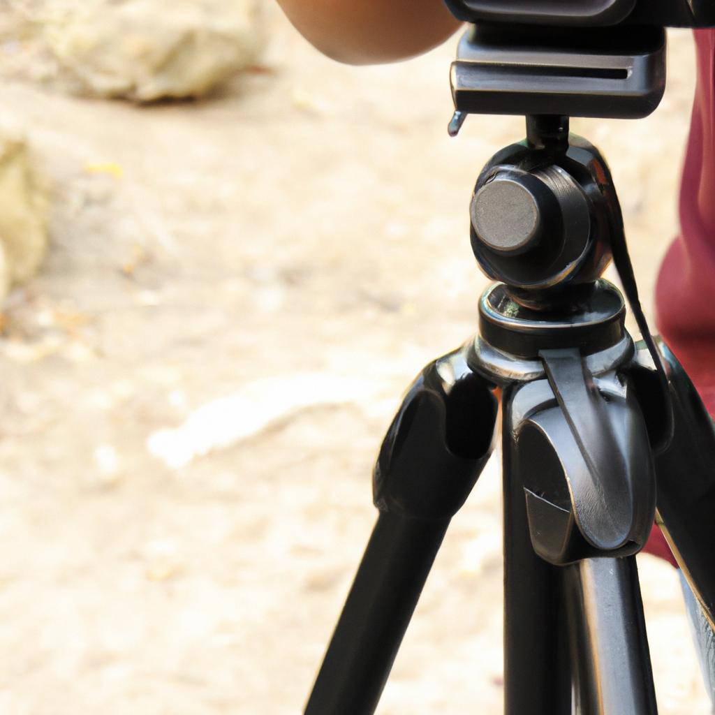 Person using tripod for photography